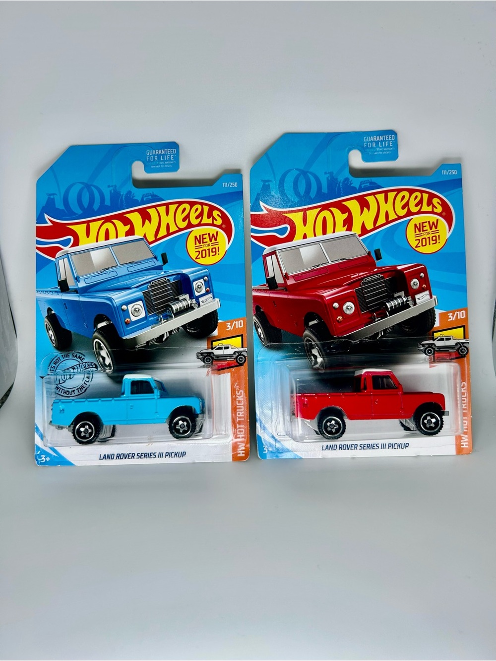 Hot Wheels Land Rover Lot Of 2x - Land Rover Series III Pickup Blue & Red NEW